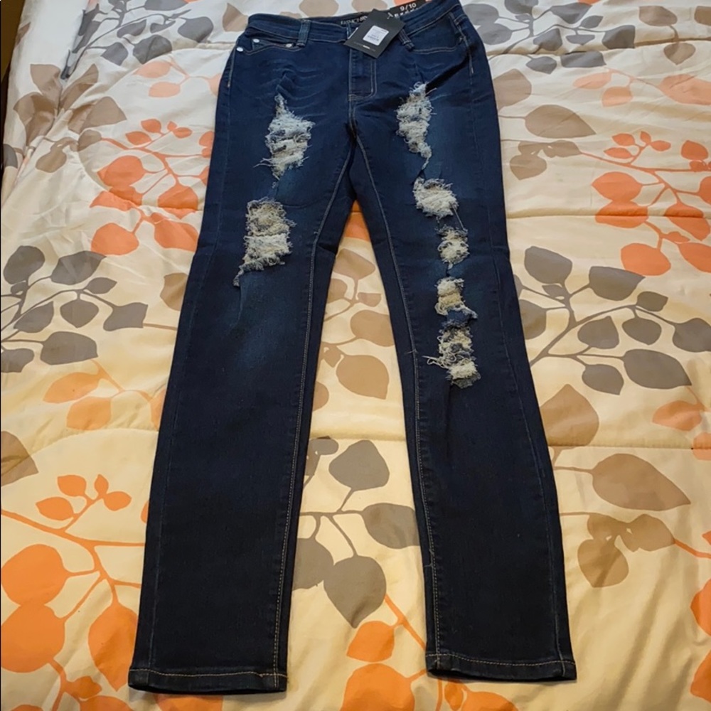 Dark high waisted skinny ripped jeans